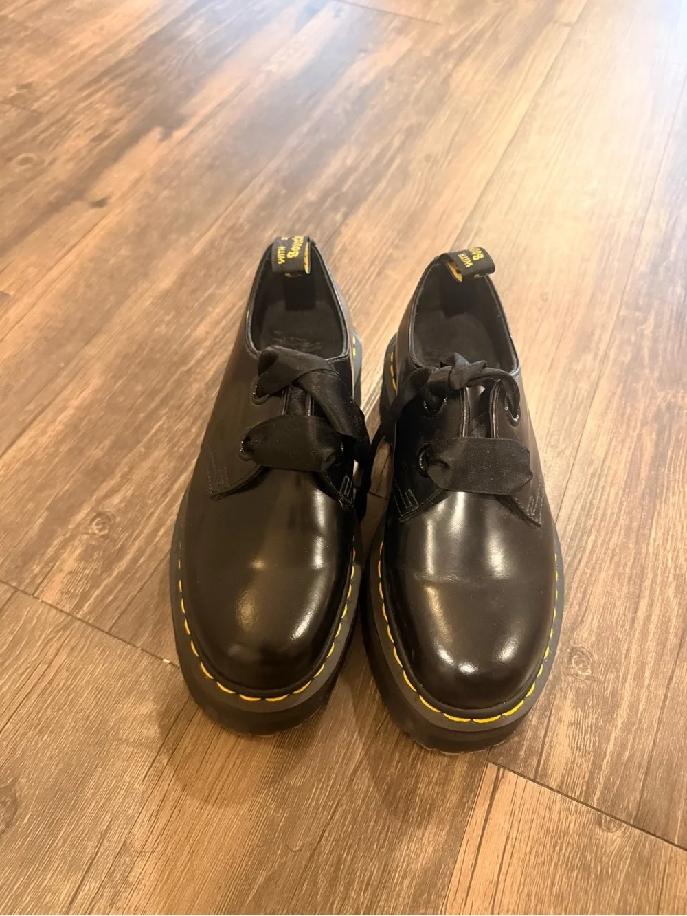 Dr. Martens Holly Black Leather Platform Shoes with Yellow Stitching